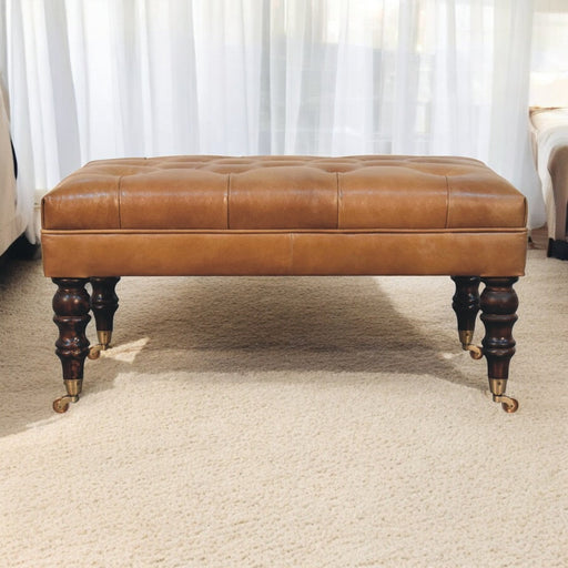 Monroe Tan Buffalo Leather Ottoman with Castor Legs Glass House Furnishings