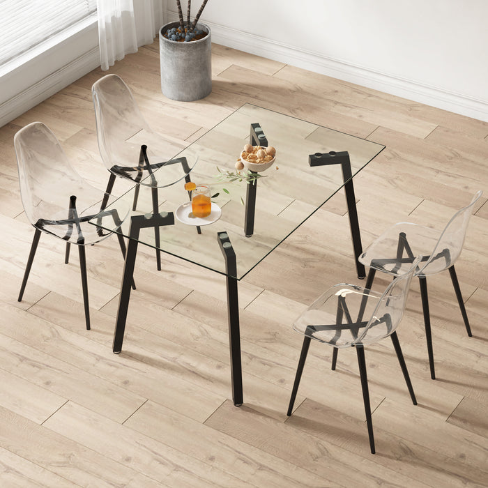 Table and chair set, transparent glass tabletop and black metal table legs, transparent plastic backrest cushion and black metal chair legs, one table with four chairs.DRT-1123  TW-1200