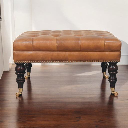 Bennett Studded Tan Buffalo Leather Ottoman with Castor Legs Glass House Furnishings