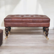 Sterling Brown Buffalo Leather Ottoman with Castor Legs Glass House Furnishings